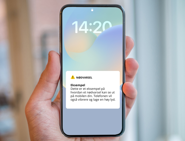 Hånd som holder en mobiltelefon med illustrasjon av varsel